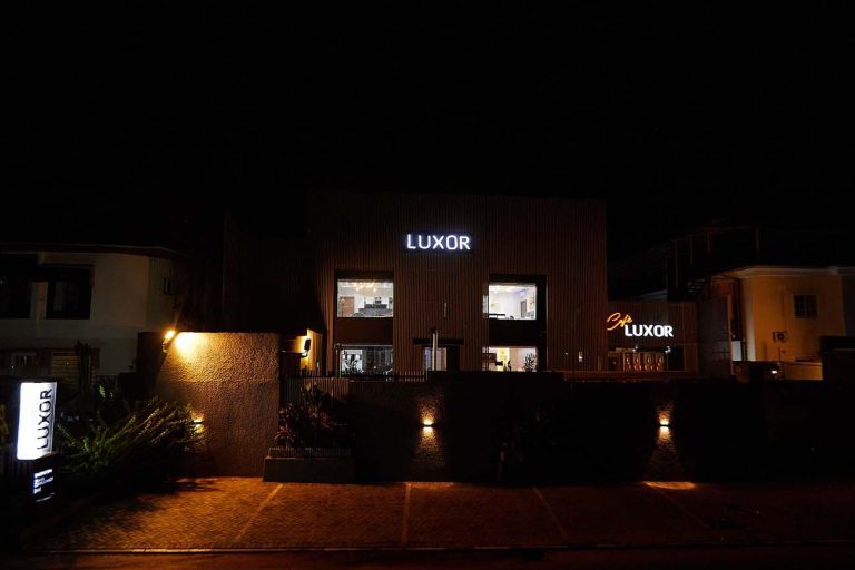 Luxor café building illuminated at night