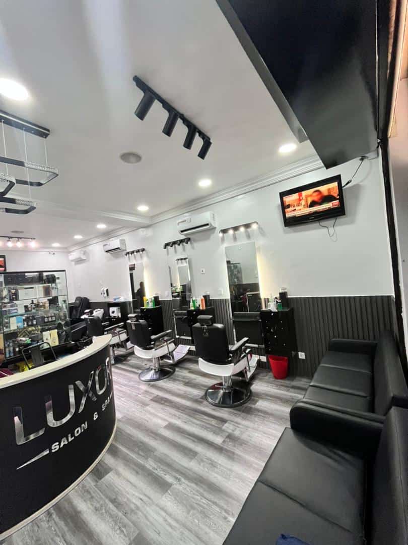 Modern hair salon interior with styling chairs and mirrors
