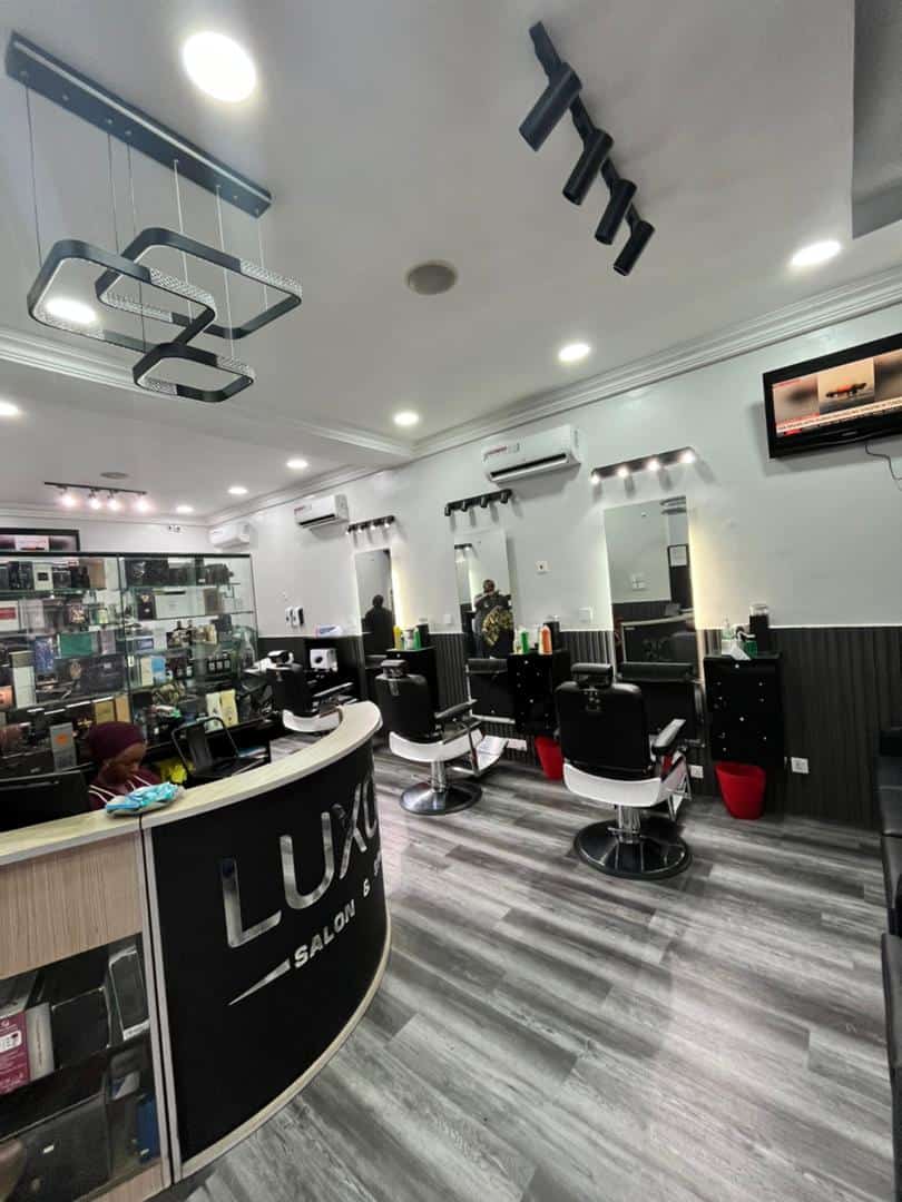 Modern hair salon interior with styling chairs and mirrors