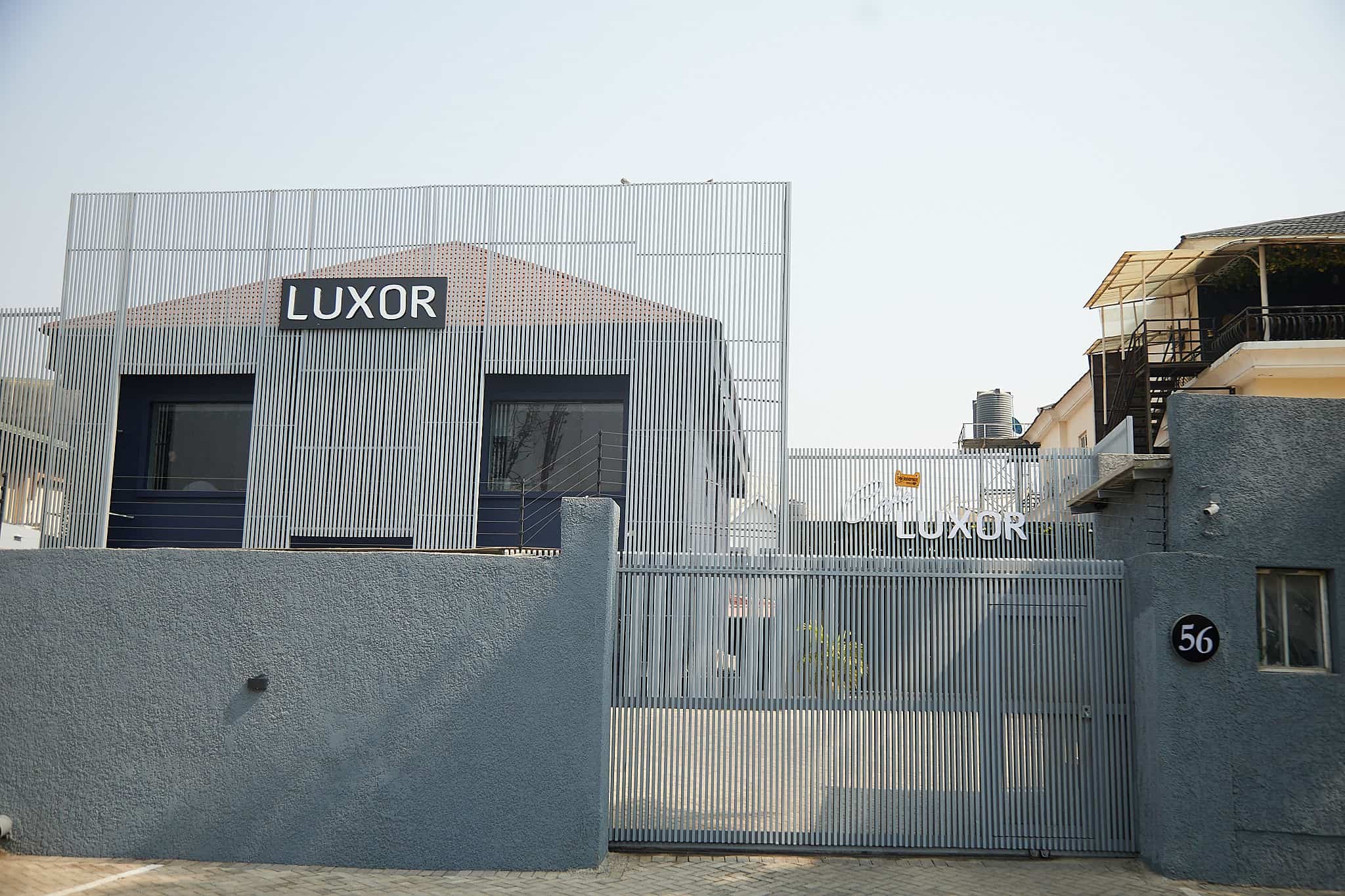 Modern LUXOR office building behind gated entrance