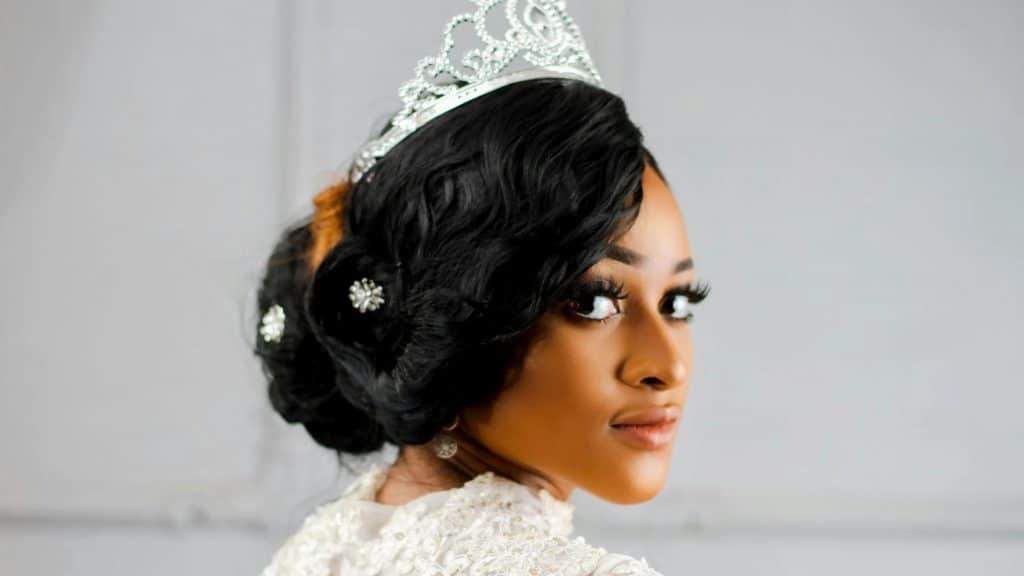 Woman wearing tiara with elegant bridal hairstyle