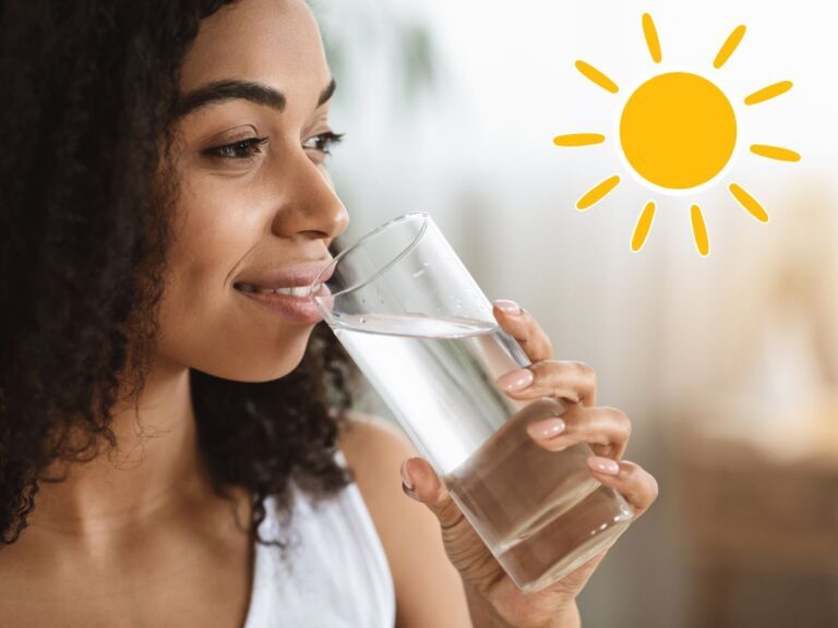 Woman drinking glass of water with sun icon