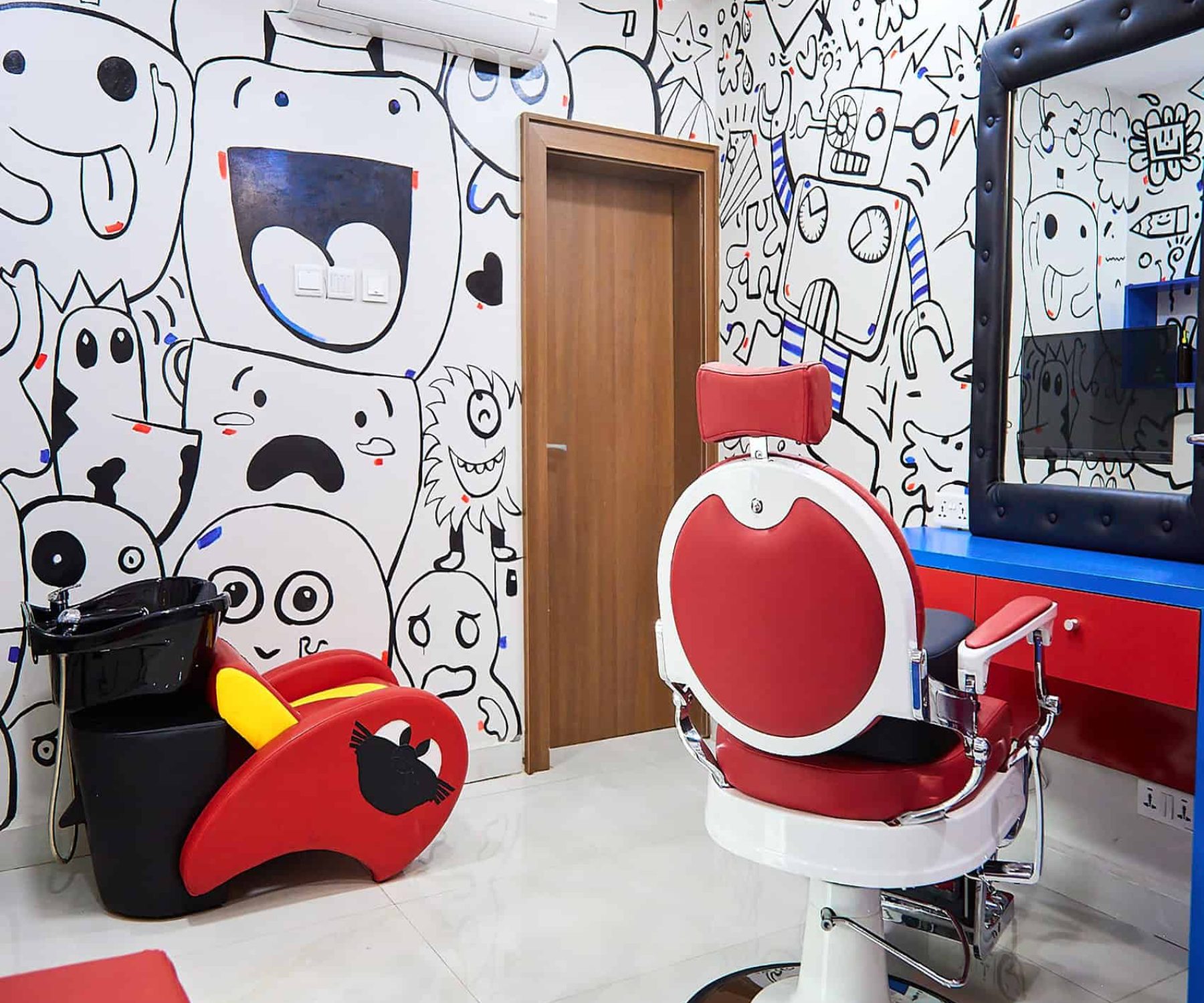 Colourful children's hair salon with cartoon mural walls